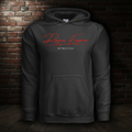 Founders Hoodie in Black against a dark brick wall