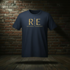 Rogue Standard Gold Tee in True Navy on a ghost form against a dark brick wall and wood floor