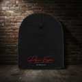 Founder’s Knit Hat in Black with boutique brick background