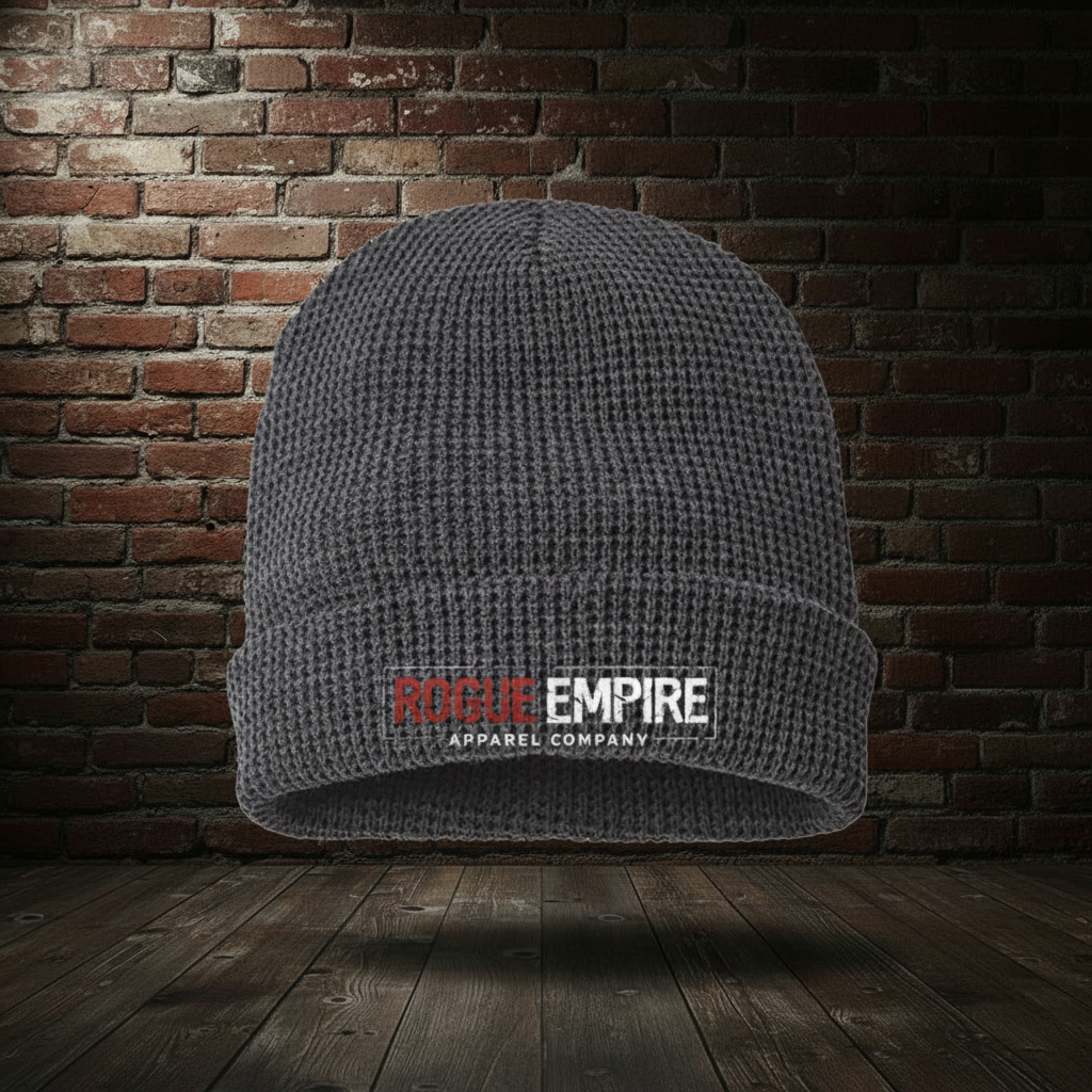 Manifest Destiny Waffle Cuffed Beanie in Heather Charcoal with boutique brick background