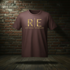 Rogue Standard Gold Tee in Athletic Maroon on a ghost form against a dark brick wall and wood floor