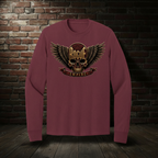 Rogue Empire Winged Skull Crest long sleeve tee in Athletic Maroon with boutique brick-wall background